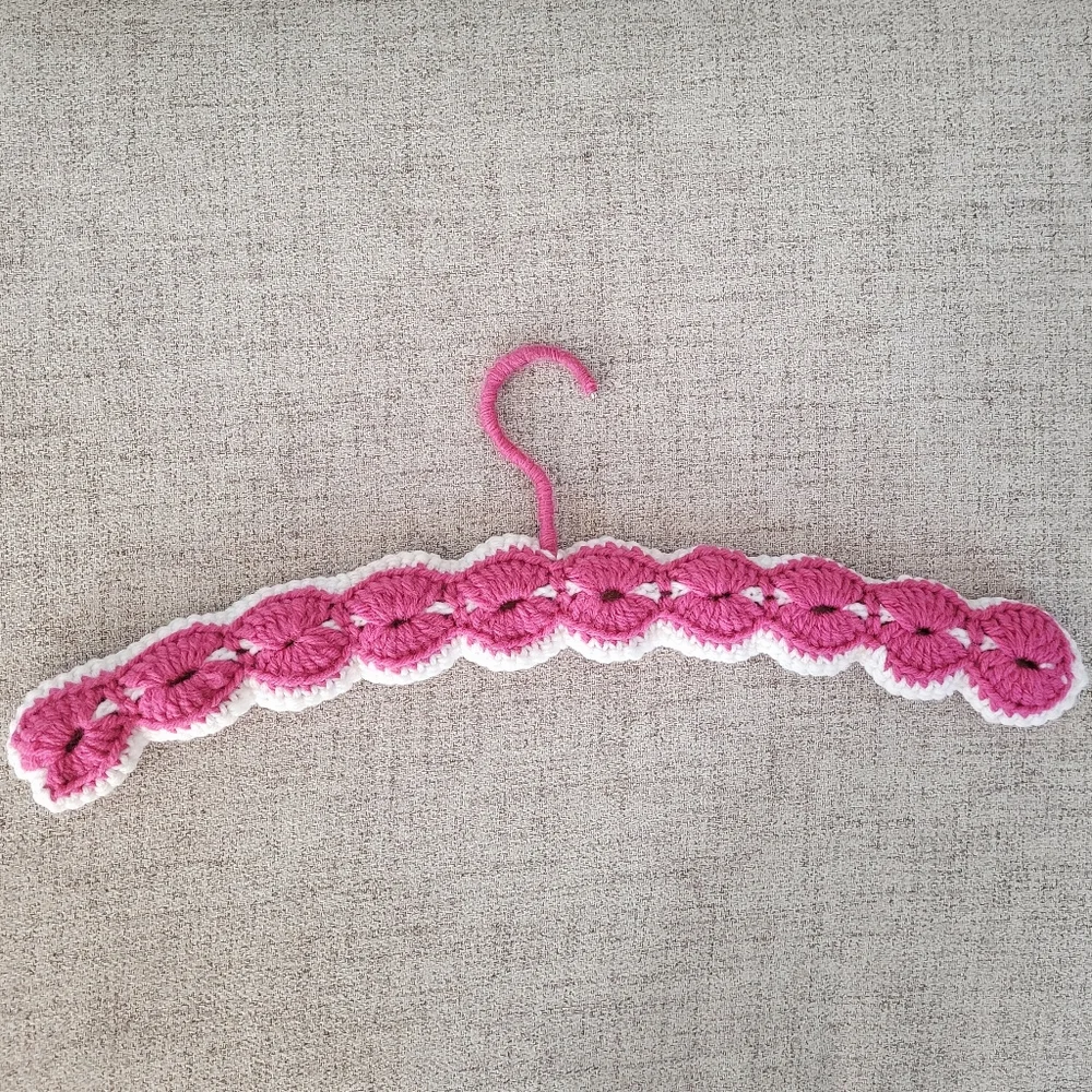 Vintage handmade knit clothing hanger